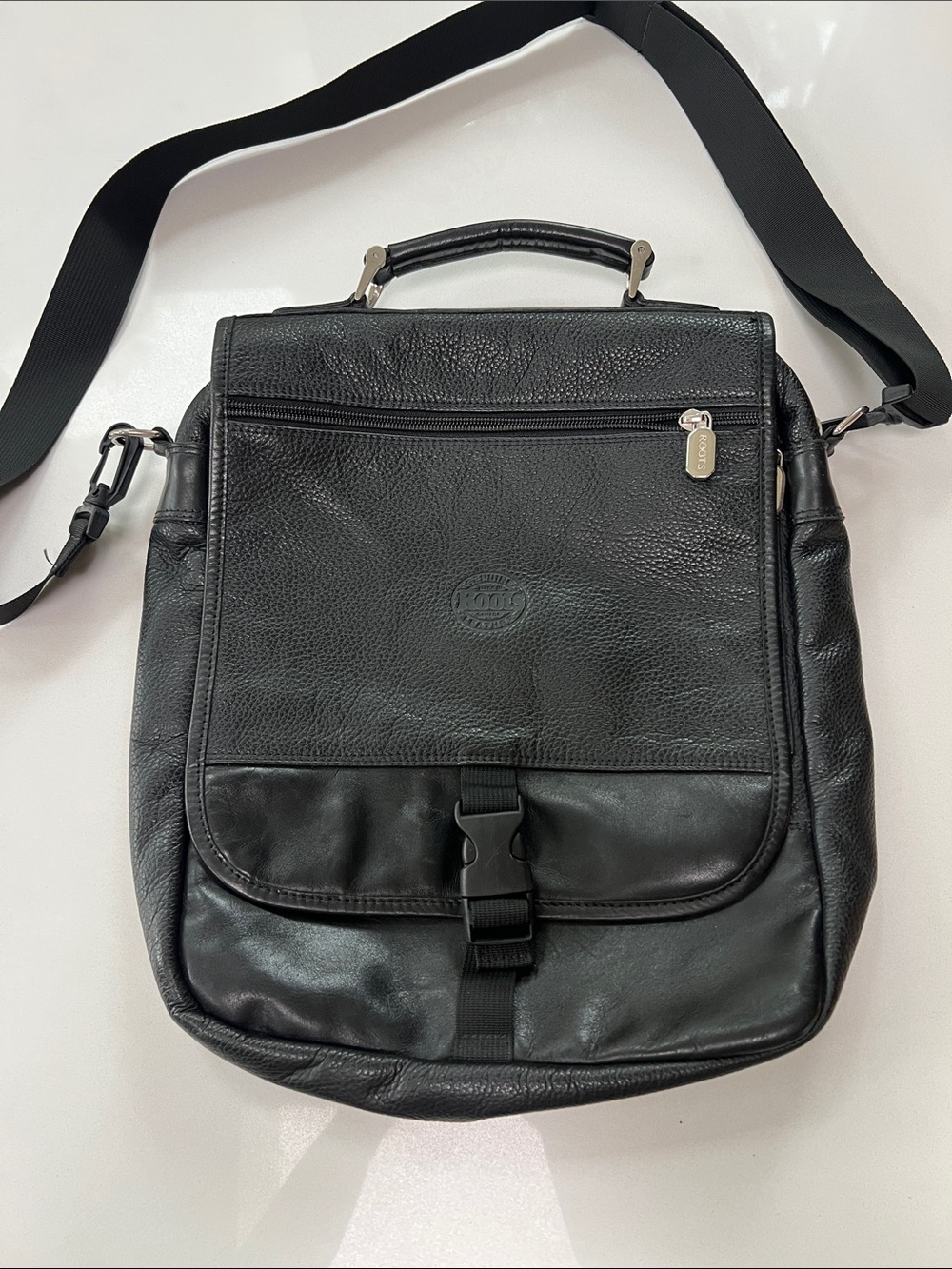 Men's Black Leather Messenger Bag by Roots with Top Handle and Adjustable Strap